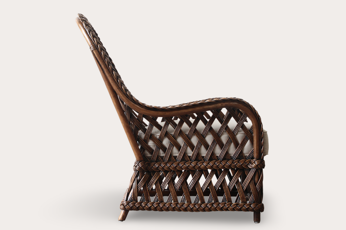 woven rattan high back armchair