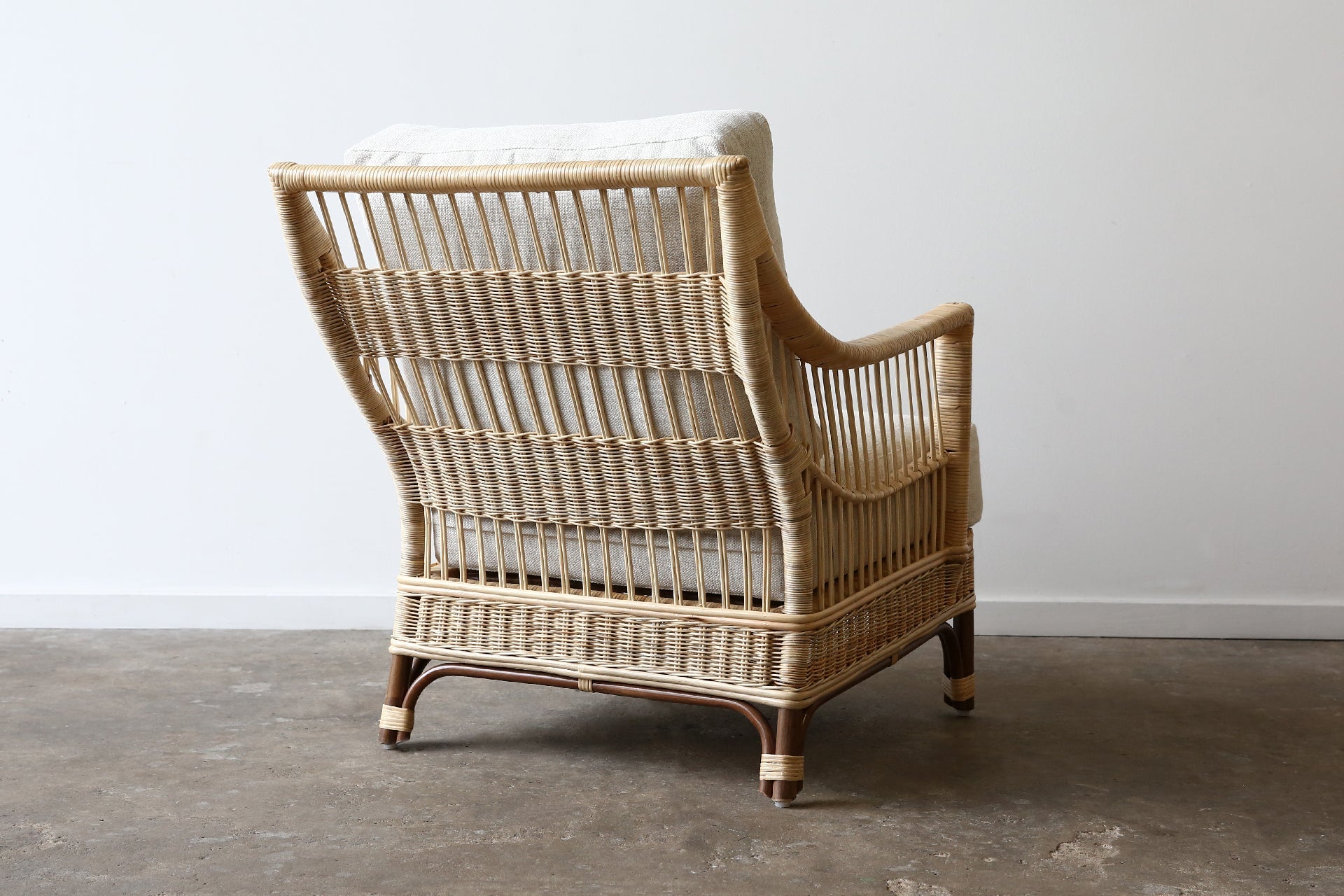 Barletta Armchair. Brown Frame Natural Weave
