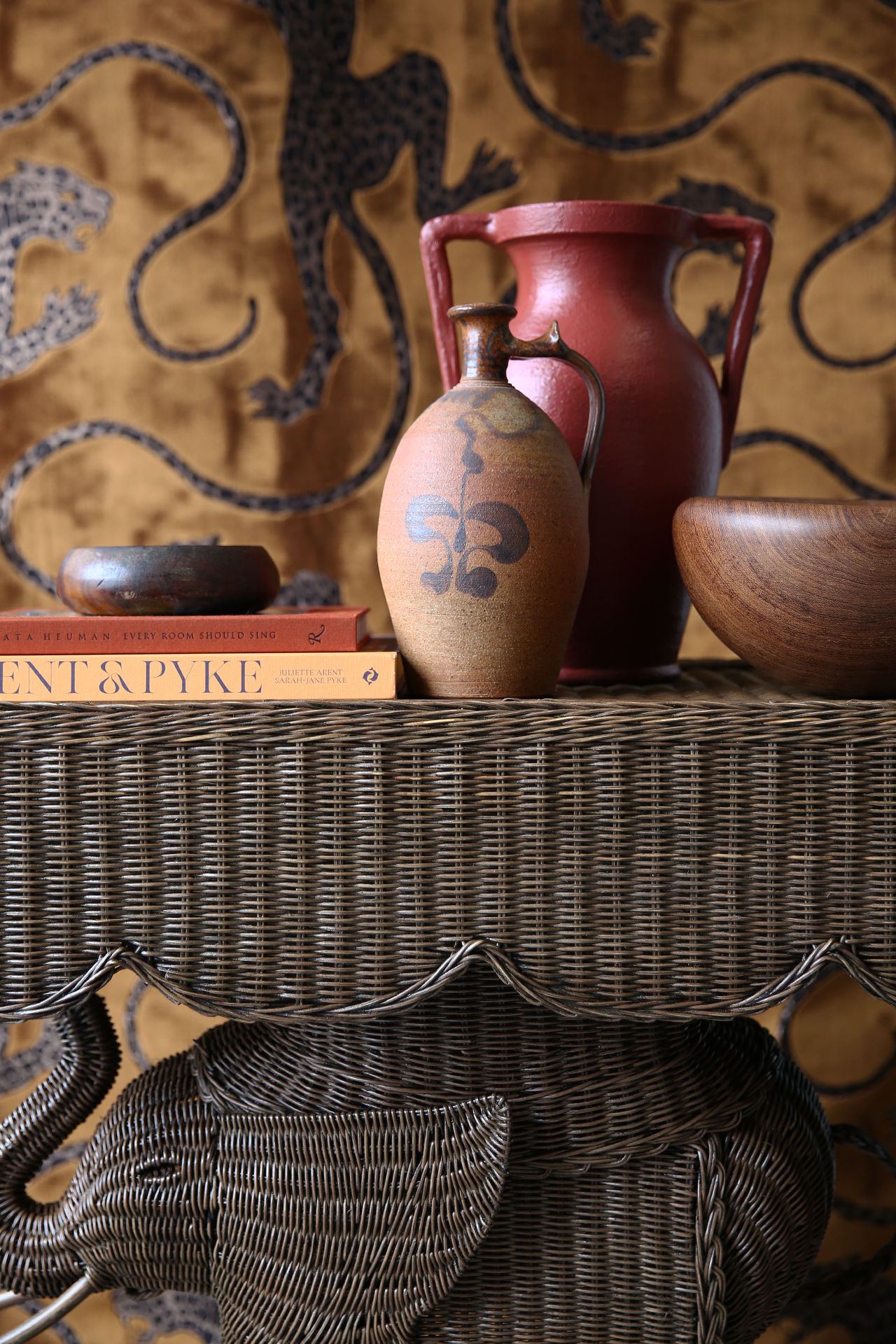 Jelani Elephant Console made from woven wicker and rattan finished in brown wash stain