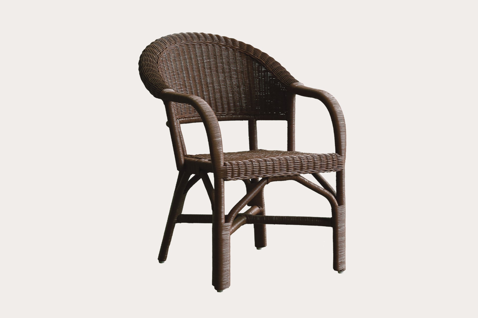 Wicker chair on a light gray background