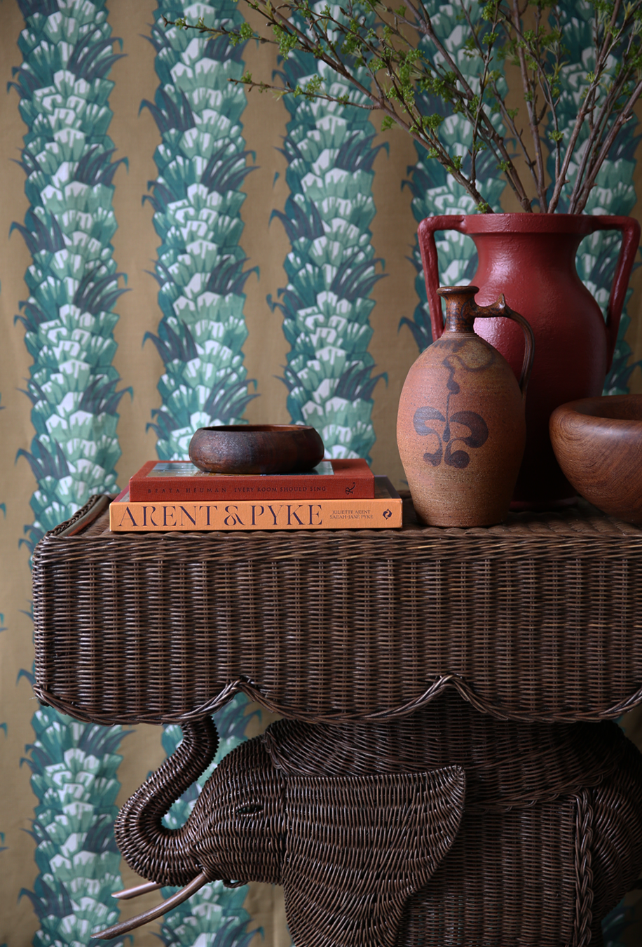 Jelani Elephant Console made from woven wicker and rattan finished in brown wash stain