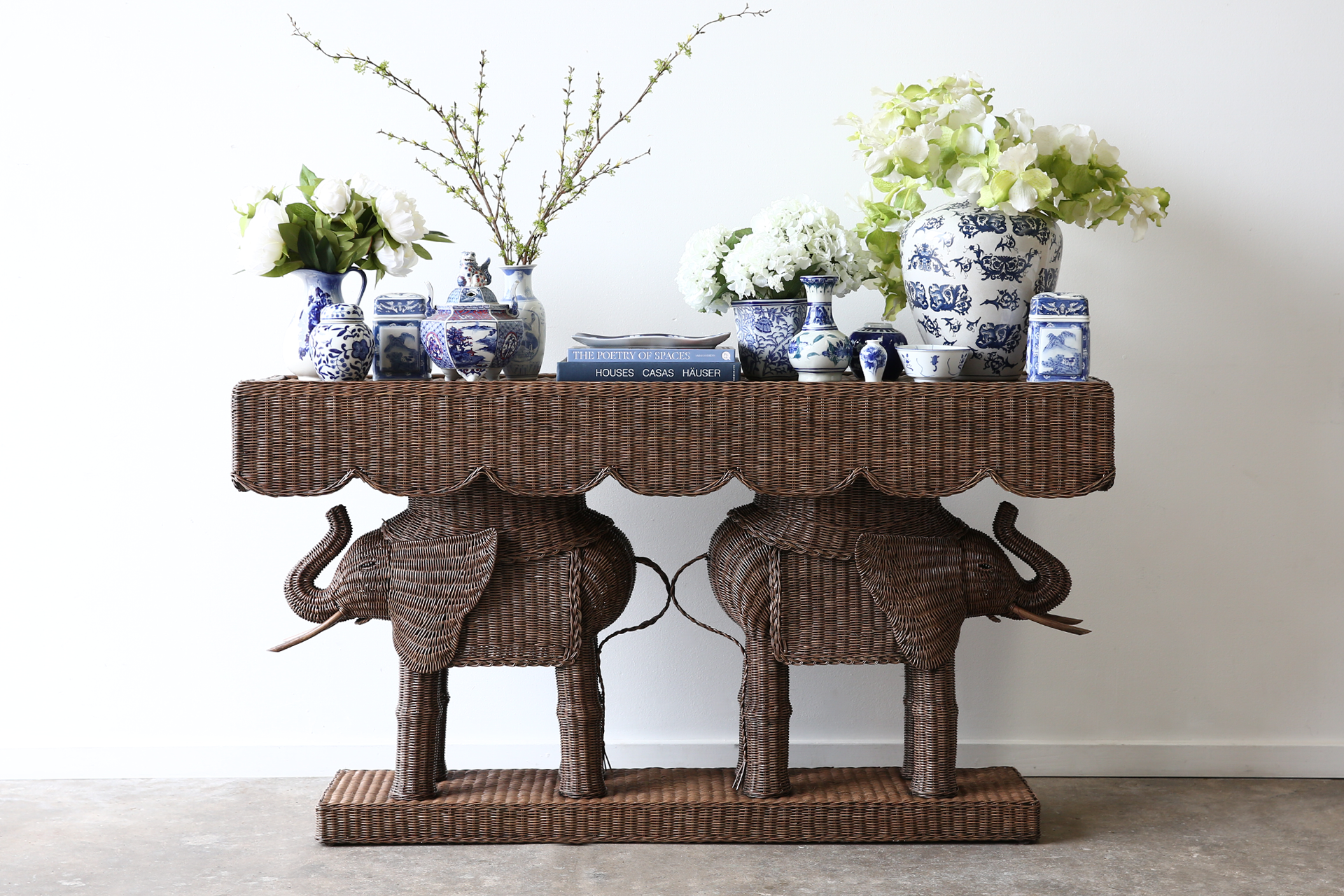 Jelani Elephant Console made from woven wicker and rattan finished in brown wash stain