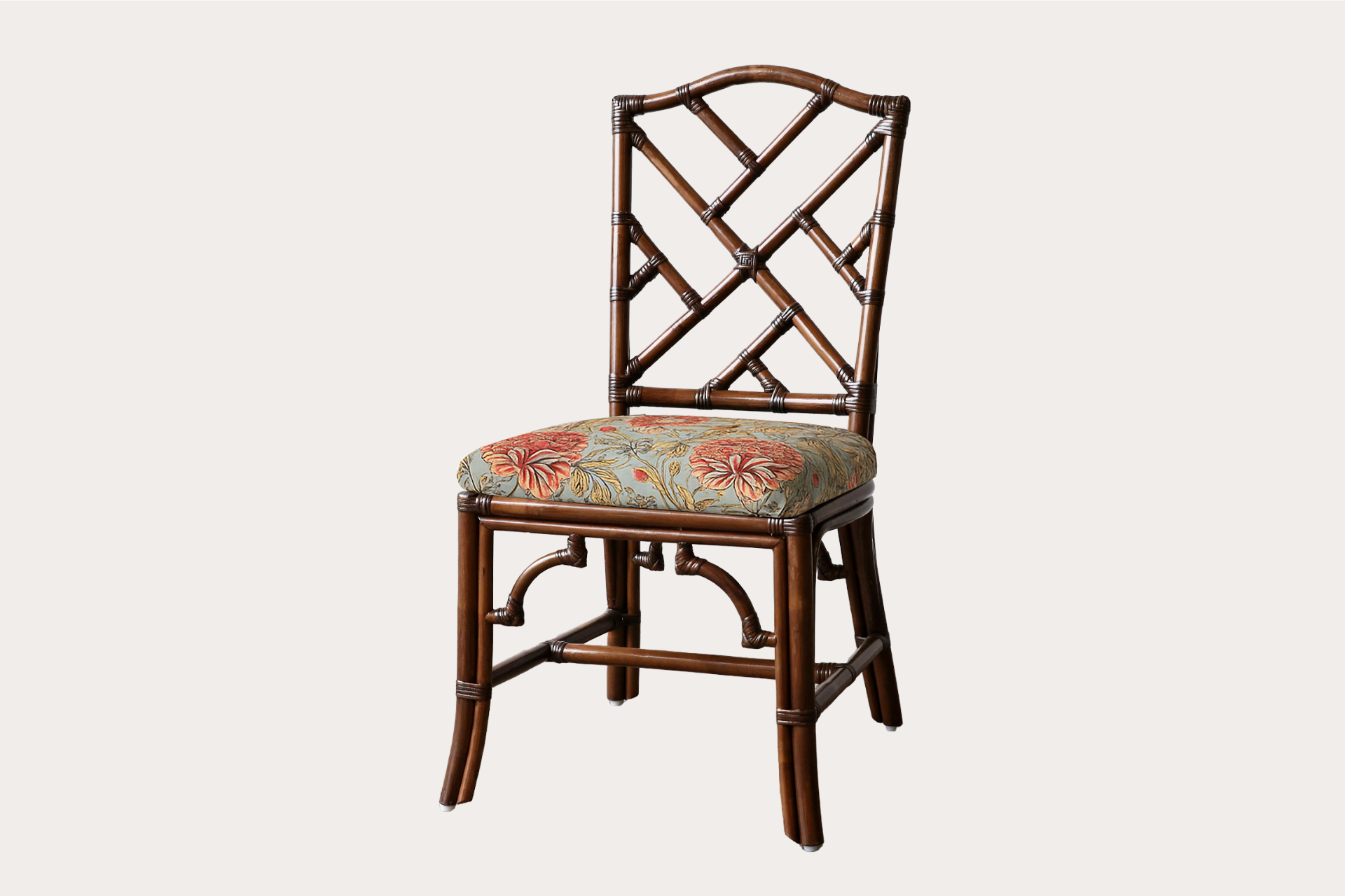 Rattan made Chippendale dining chairs with upholstered cushion.