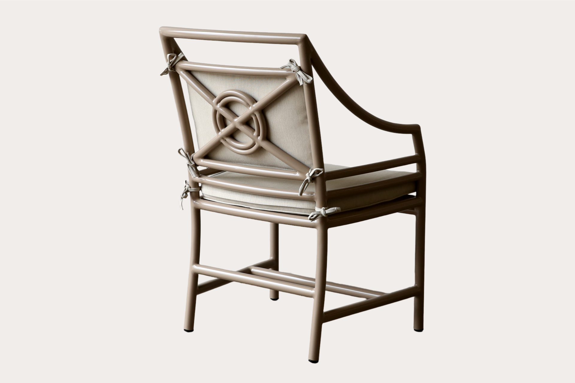 Target carver chair made from powder-coated aluminium with cushion seat and knotted back detail