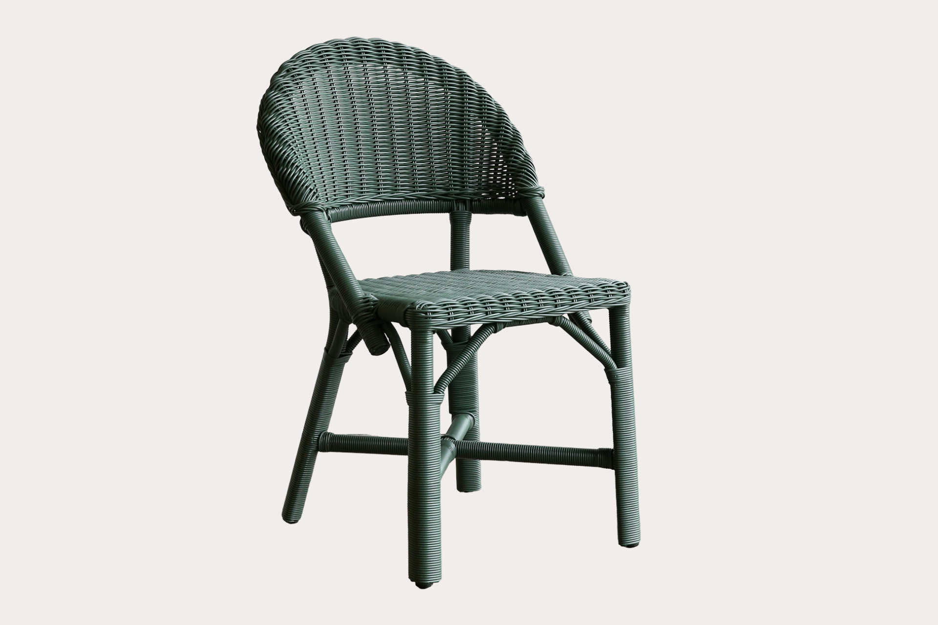 outdoor woven dining chair in wilderness green like Drucker.