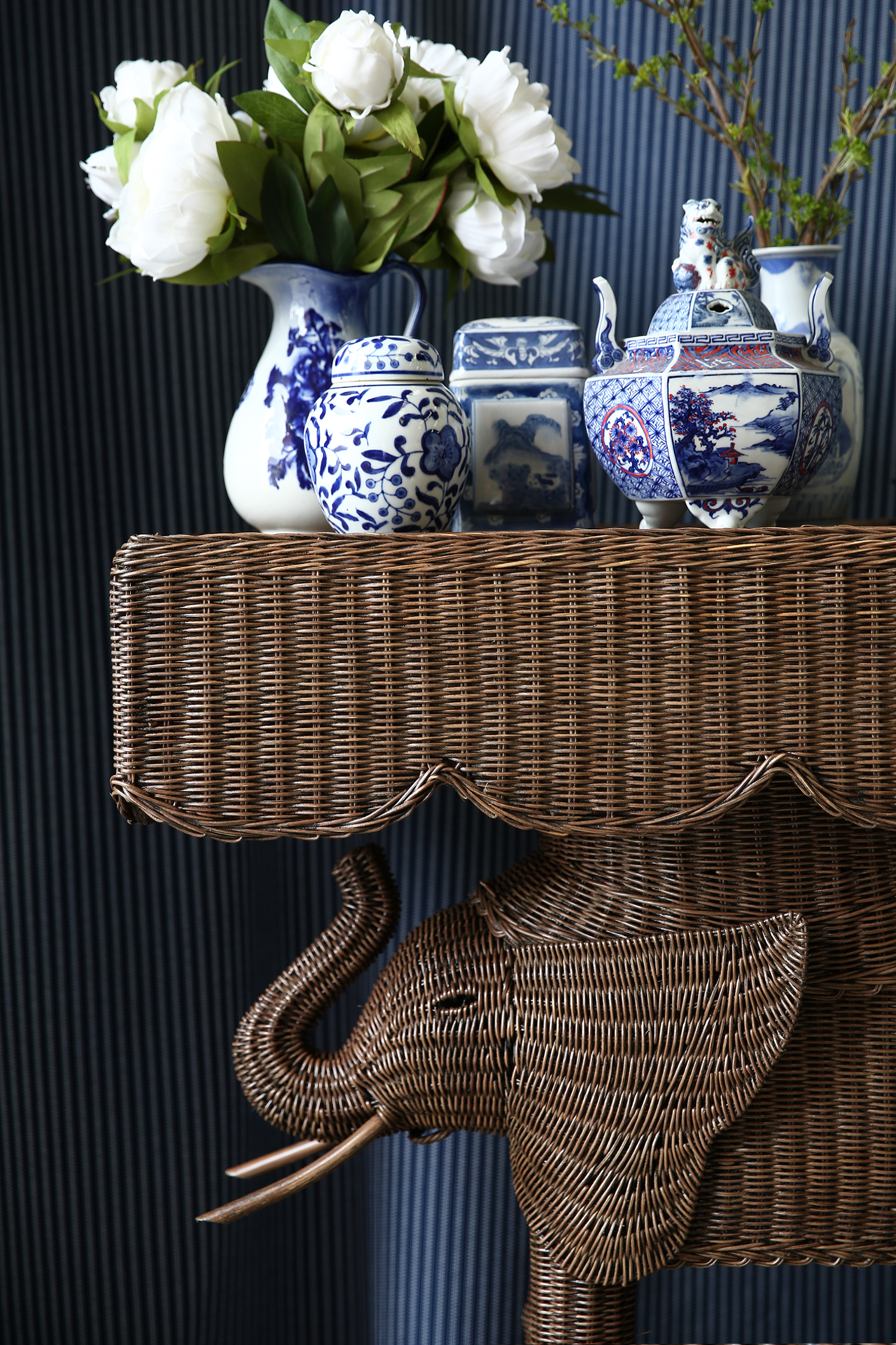 Jelani Elephant Console made from woven wicker and rattan finished in brown wash stain