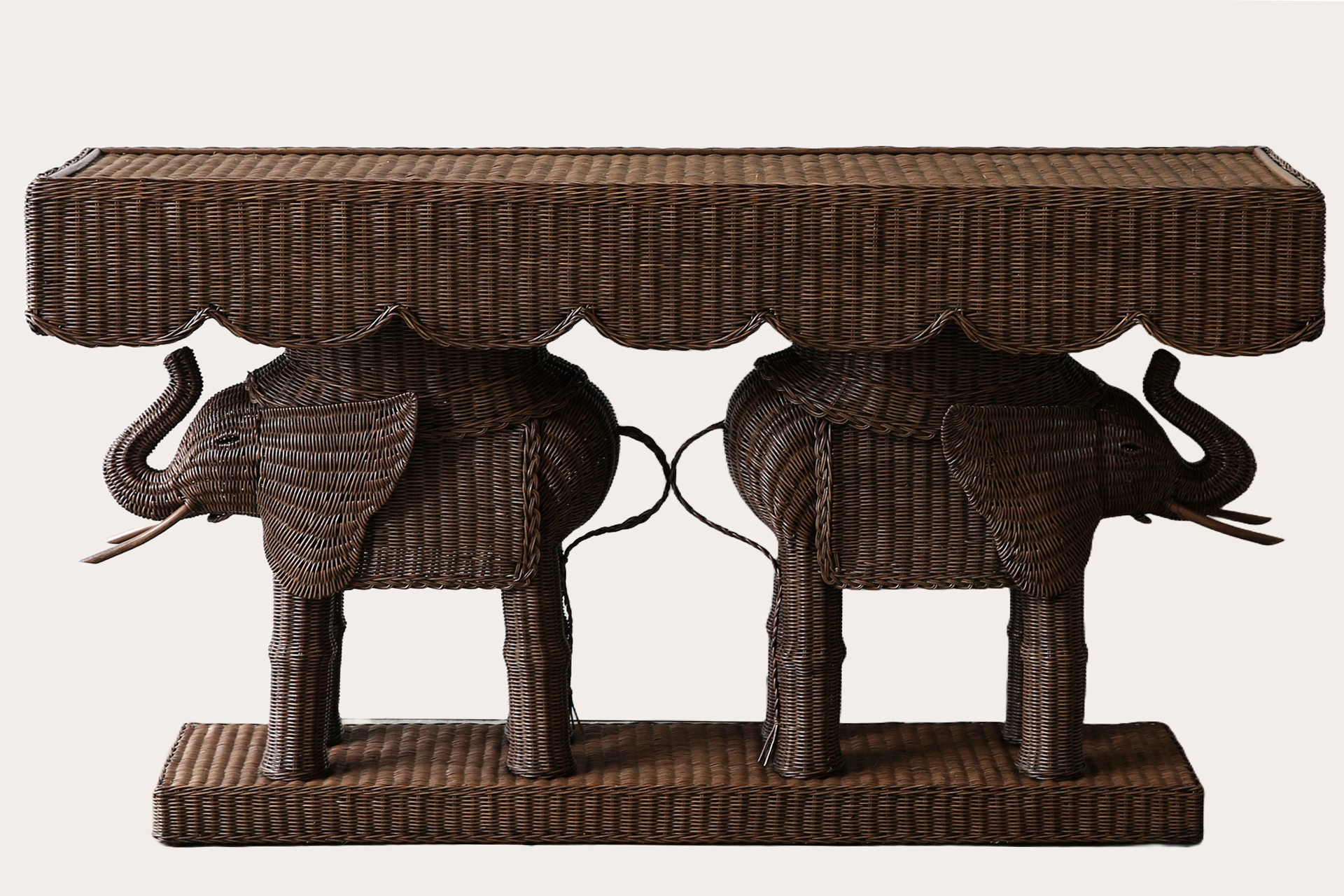Jelani Elephant Console made from woven wicker and rattan finished in brown wash stain