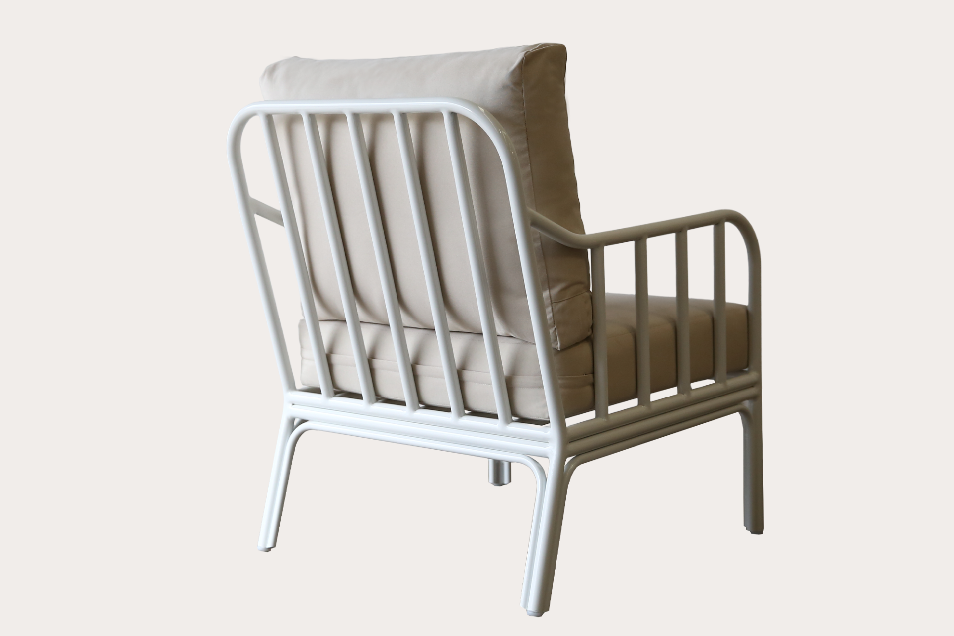 Outdoor armchair made from Aluminium and finished in white powder coat with outdoor fabric and foams.