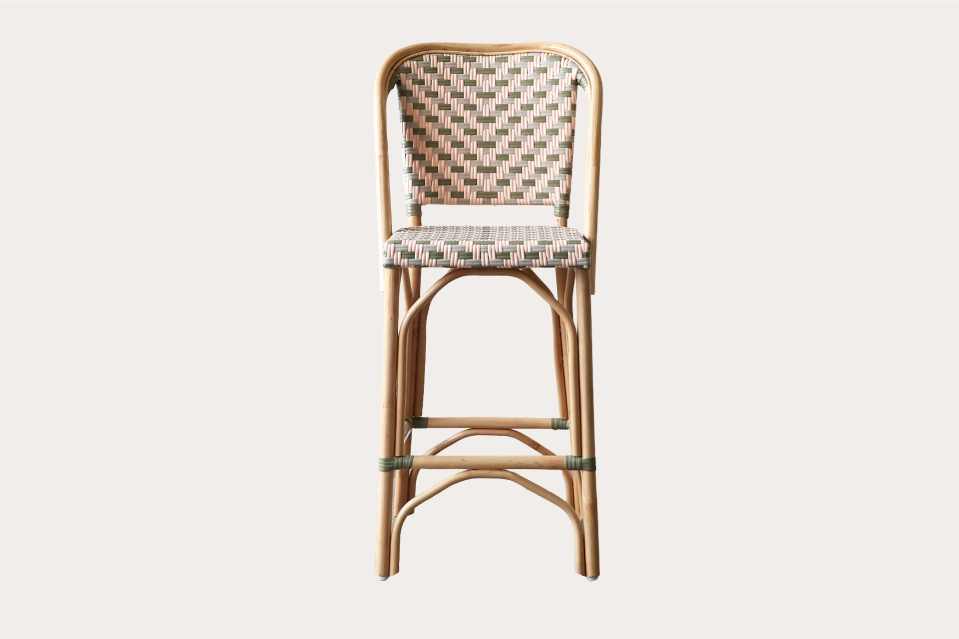 Commercial-grade woven rattan barstool with footrest and patterned seat for bar or café settings